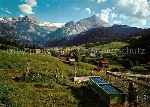 AK / Ansichtskarte Lauenen Panorama gegen Wildhorn Spitzhorn Berner Alpen Lauenen
