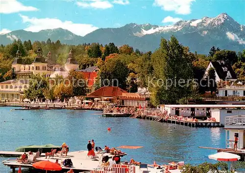 AK / Ansichtskarte Velden_Woerthersee Strandbad mit Mittagskogel Velden Woerthersee