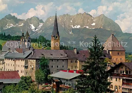 AK / Ansichtskarte Kitzbuehel_Tirol Ortsmotiv mit Kirche Wilder Kaiser Kaisergebirge Kitzbuehel Tirol