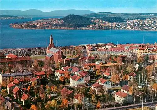 AK / Ansichtskarte oestersund Nya Kyrkan i bakgrunden Storsjoen Froesoen och Oviksfjaellen oestersund