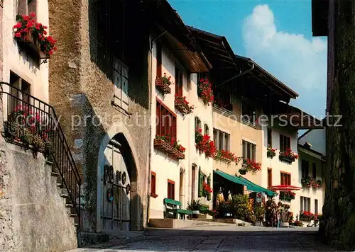 AK / Ansichtskarte Gruyeres_FR Rue pittoresque a l entree de la ville Gruyeres FR