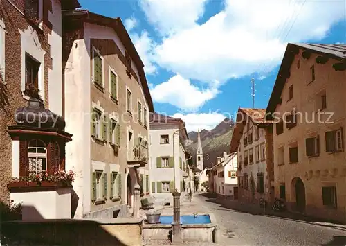 AK / Ansichtskarte S chanf Dorfpartie Brunnen S chanf