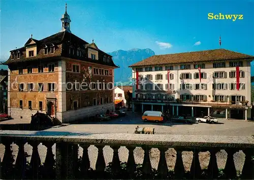 AK / Ansichtskarte Schwyz Rathaus und Hotel Weisses Roessli Schwyz