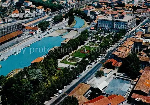 AK / Ansichtskarte Carcassonne Vue generale aerienne la gare et le square Carcassonne
