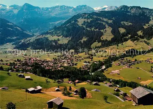 AK / Ansichtskarte Lenk_Simmental Fliegeraufnahme mit Wildhorn Lenk Simmental