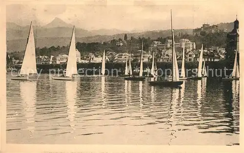 AK / Ansichtskarte Evian les Bains_Haute_Savoie Panorama vu du Lac Les Regates Evian les Bains_Haute