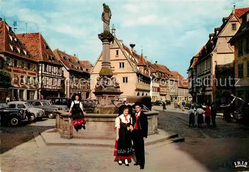 AK / Ansichtskarte Obernai_Bas_Rhin Place du Marche Costumes Fontaine Obernai_Bas_Rhin