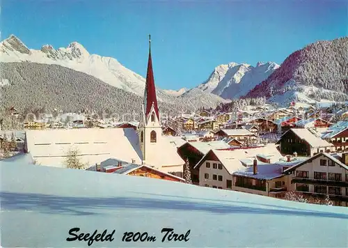 AK / Ansichtskarte Seefeld_Tirol Ortsansicht mit Kirche Wetterstein  und Karwendelgebirge Winterlandschaft Seefeld Tirol
