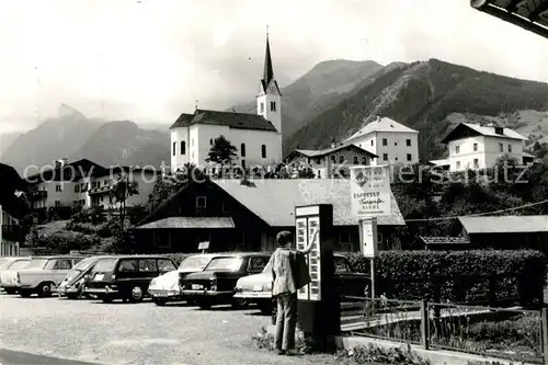 AK / Ansichtskarte Kaprun Ortsmotiv mit Blick zur Kirche Kaprun