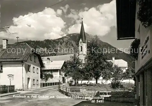 AK / Ansichtskarte Russbach_Pass_Gschuett Ortsmotiv mit Kirche mit Gamsfeld Russbach_Pass_Gschuett