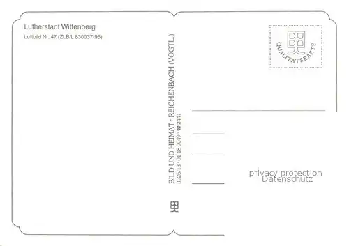 AK / Ansichtskarte Wittenberg_Lutherstadt Fliegeraufnahme mit Kirche Wittenberg_Lutherstadt