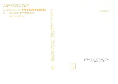 AK / Ansichtskarte Wittenberg_Lutherstadt Fliegeraufnahme mit Kirche Wittenberg_Lutherstadt