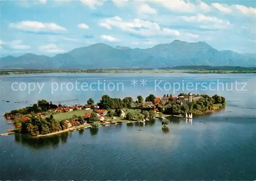 AK / Ansichtskarte Chiemsee Fraueninsel mit Hochfelln und Hochgern Fliegeraufnahme Chiemsee