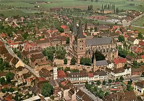 AK / Ansichtskarte Xanten Stadt und Roemisches Amphitheater Fliegeraufnahme Xanten