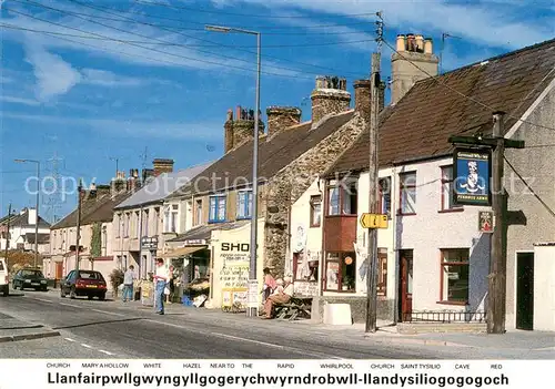 AK / Ansichtskarte Llanfairpwllgwyngyll Street scene in the village 