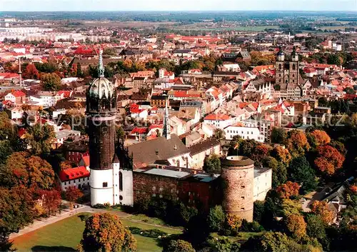 AK / Ansichtskarte Wittenberg_Lutherstadt Fliegeraufnahme mit Schlosskirche Wittenberg_Lutherstadt