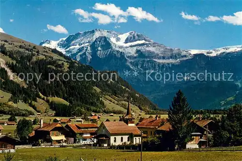 AK / Ansichtskarte Lenk_Simmental Dorfpartie mit Wildstrubel Lenk Simmental