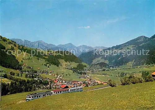 AK / Ansichtskarte Zweisimmen mit Stockhornkette und MO Bahn Zweisimmen
