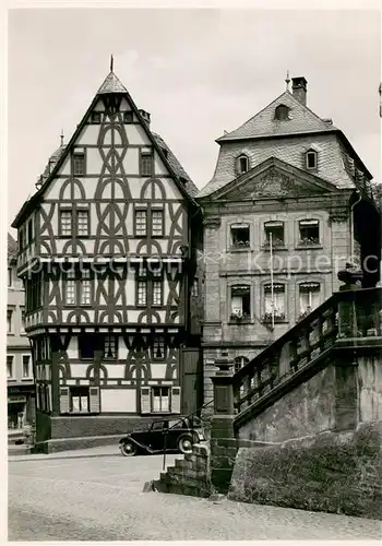 AK / Ansichtskarte Aschaffenburg_Main Stiftsplatz Loewenapotheke Stiftsgloecknerhaus Historisches Gebaeude Fachwerkhaus Aschaffenburg Main