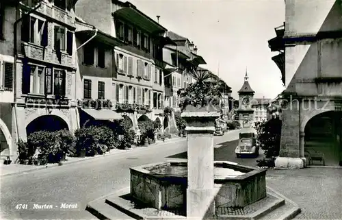 AK / Ansichtskarte Murten_Morat Ortspartie mit Brunnen Murten Morat