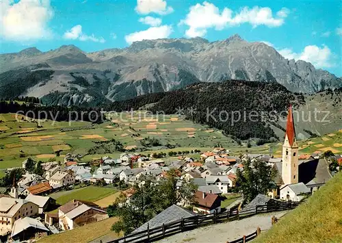 AK / Ansichtskarte Nauders_Tirol mit Kirche und Piz Mandin Nauders Tirol