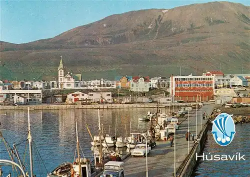 AK / Ansichtskarte Husavik Harbour scene and town centre Husavik 