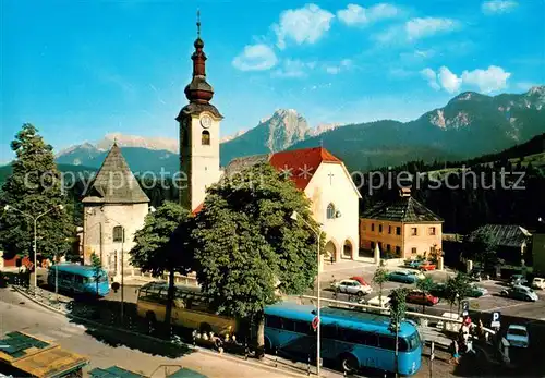 AK / Ansichtskarte Tarvisio Stadtansicht mit Kirche und Mangartkette Tarvisio