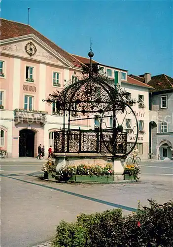 AK / Ansichtskarte Bruck_Mur Eiserner Brunnen mit Rathaus Bruck_Mur