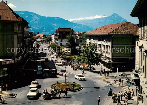 AK / Ansichtskarte Interlaken_BE Centralplatz Bahnhofstrasse und Niesen Interlaken_BE