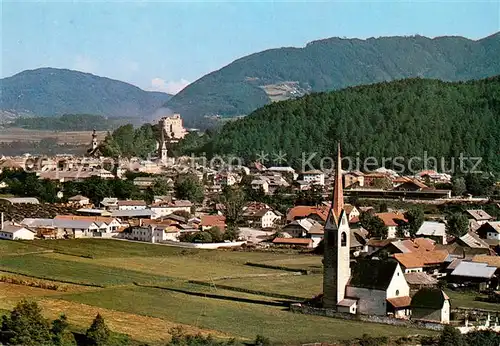 AK / Ansichtskarte Bruneck Ortsansicht mit Kirche und Schloss Landschaftspanorama Pustertal Bruneck