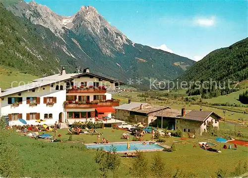 AK / Ansichtskarte Pettneu_Arlberg Hotel Pension Gridlon Swimming Pool Stanzer Tal Alpen Pettneu Arlberg