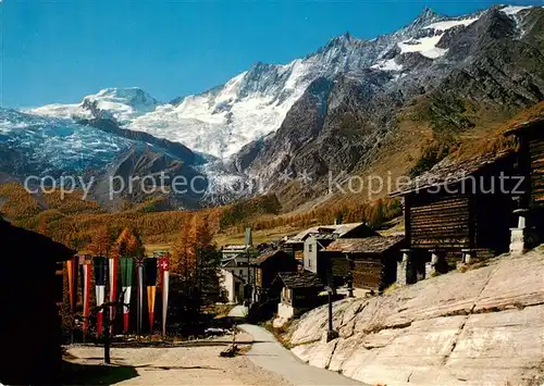 AK / Ansichtskarte Saas Fee Bergdorf mit Blick zu Alphubel und Mischabelkette Walliser Alpen Saas Fee