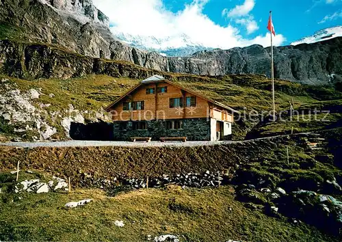 AK / Ansichtskarte Gstaad Geltenhuette mit Wildhorn Berghuette Berner Alpen Gstaad