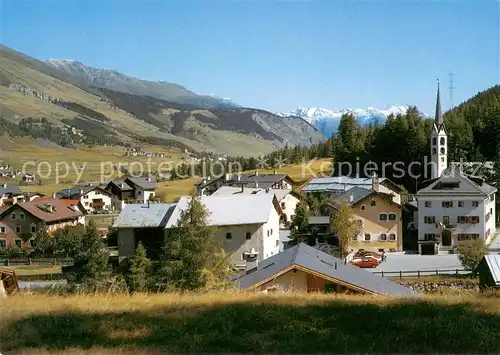 AK / Ansichtskarte La_Punt Chamues ch Ortsansicht mit Kirche Alpen La_Punt Chamues ch