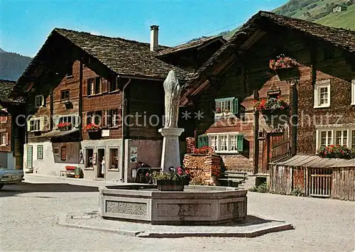 AK / Ansichtskarte Vals_GR Dorfplatz Brunnen Vals_GR
