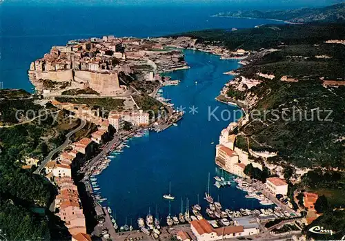 AK / Ansichtskarte Bonifacio_Corse_du_Sud Les quais La Haute Ville Vue aerienne Bonifacio_Corse_du_Sud