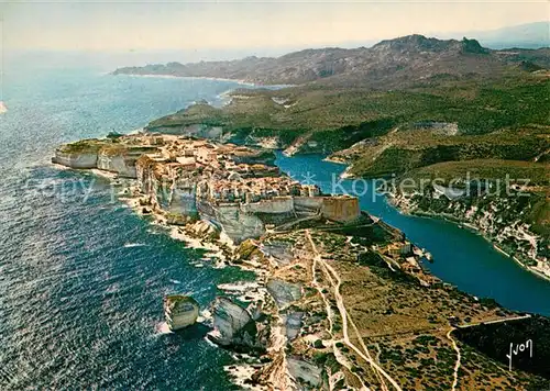 AK / Ansichtskarte Bonifacio_Corse_du_Sud Les falaises Ville fortifiee Port vue aerienne Collection Couleurs et Lumiere de France Bonifacio_Corse_du_Sud