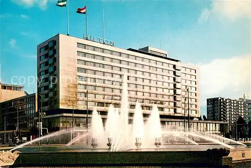 AK / Ansichtskarte Rotterdam Hofplein met Hilton Hotel Wasserspiele Rotterdam