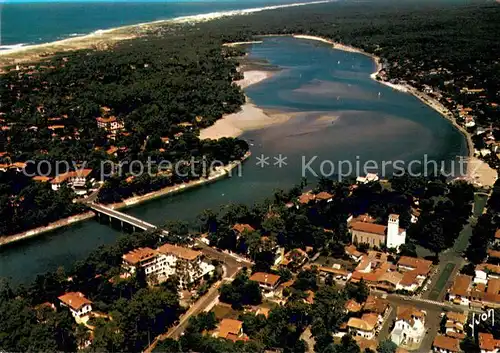 AK / Ansichtskarte Hossegor_Soorts_Landes Une partie de la Ville avec le Lac et lOcean Vue aerienne Hossegor_Soorts_Landes