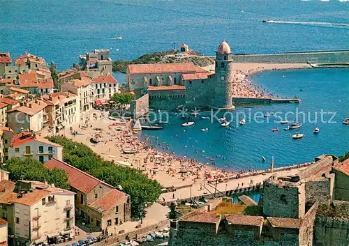 AK / Ansichtskarte Collioure Vue aerienne du port des plages et de leglise fortifiee Collioure