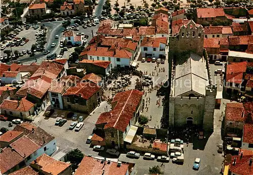 AK / Ansichtskarte Les_Saintes Maries de la Mer Eglise Centre vue aerienne Les