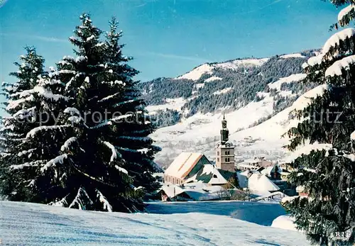 AK / Ansichtskarte Megeve Le clocher et les Pentes du Christomet en hiver Megeve