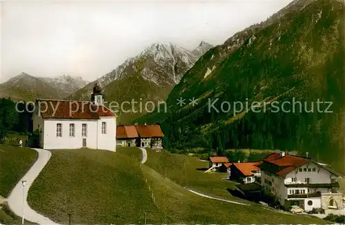 AK / Ansichtskarte Baad_Mittelberg_Kleinwalsertal Ortsansicht mit Kirche Alpen Baad_Mittelberg