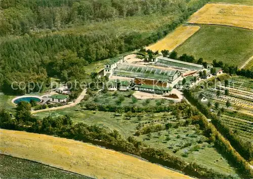 AK / Ansichtskarte Nordhastedt Hallenwellenschwimmbad Riesewohld Fliegeraufnahme Nordhastedt