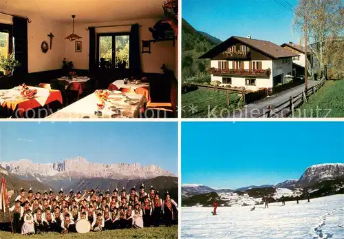 Steinegg_Karneid_Suedtirol Pension Foersterhaus Gaststube Trachtengruppe Skipiste Steinegg_Karneid_Suedtirol