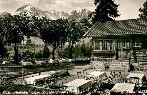 AK / Ansichtskarte Garmisch Partenkirchen Cafe Almhuette gegen Zugspitzgruppe Wettersteingebirge Huber Karte Nr. 10522 Garmisch Partenkirchen