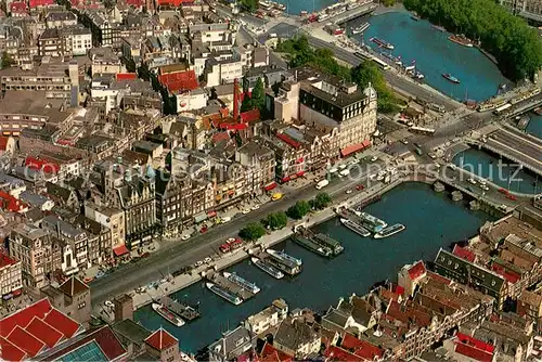 AK / Ansichtskarte Amsterdam_Niederlande Luftaufnahme Damrak und Prins Hendrikkade Amsterdam_Niederlande