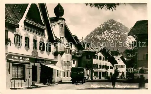 AK / Ansichtskarte Reutte_Tirol Hauptstrasse Friseur Alpenblick Reutte Tirol