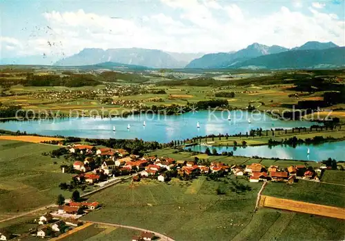AK / Ansichtskarte Tettenhausen Fliegeraufnahme mit Waginger See mit Blick auf Untersberg und Staufen Tettenhausen