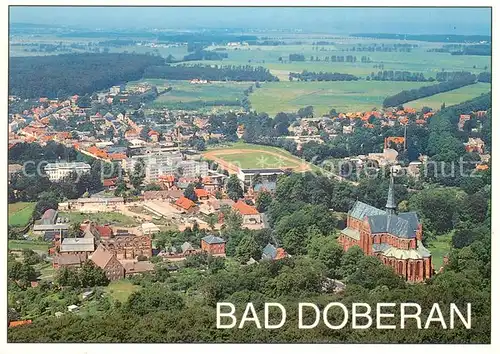 AK / Ansichtskarte Bad_Doberan Fliegeraufnahme mit Muenster und Altstadt Bad_Doberan